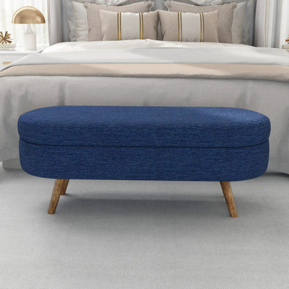 Ottoman oval storage bench in blue fabric with rubber wood legs on Tampa Home & Garden Store