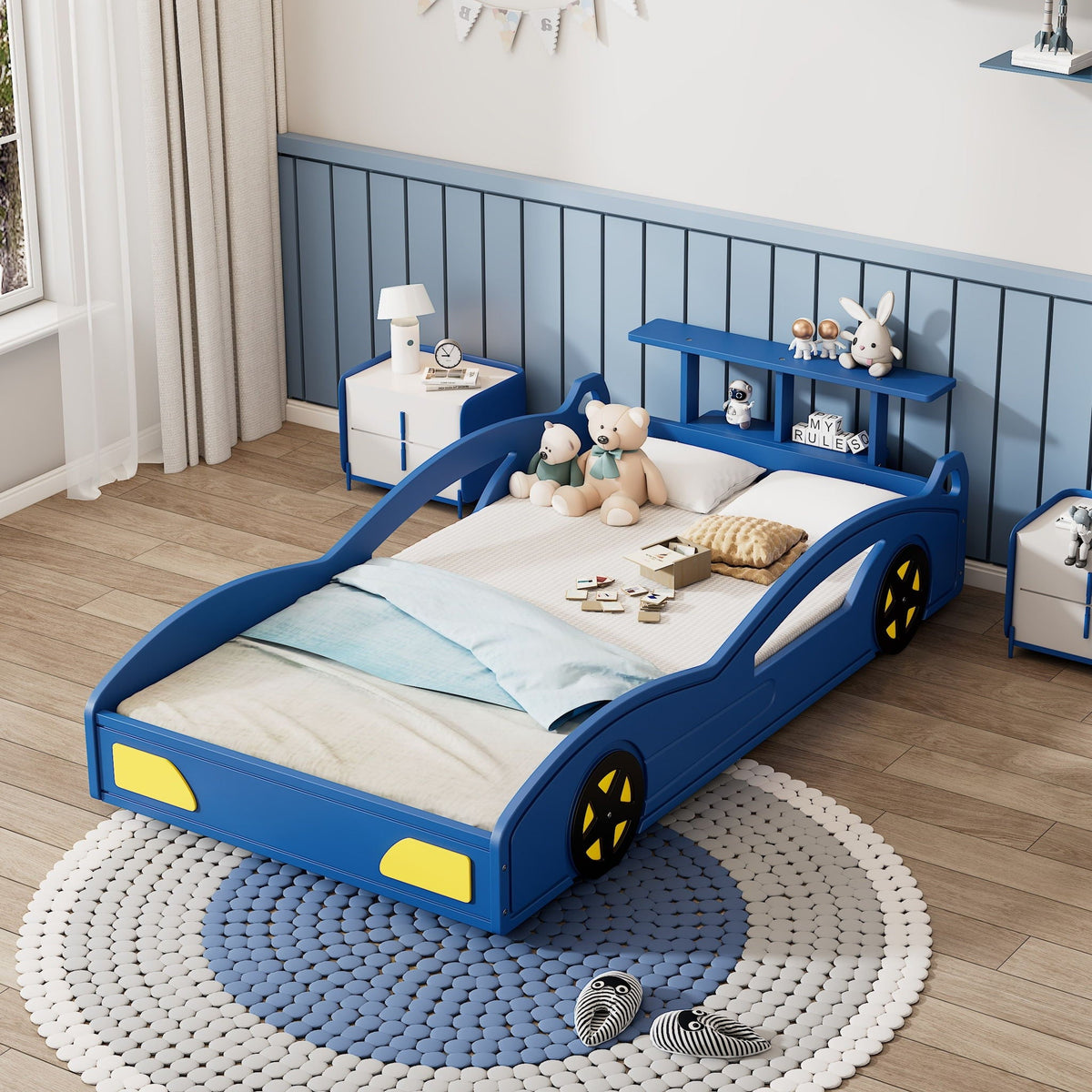 Blue race car platform bed with wheels, two car-shaped beds in kid's room with plush toys on Tampa Home & Garden Store