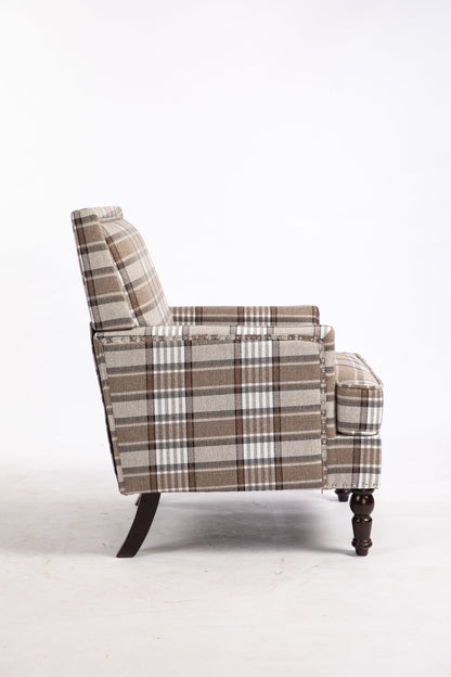 Upholstered accent chair in brown plaid linen fabric with nailhead trim and dark wood legs on Tampa Home & Garden Store
