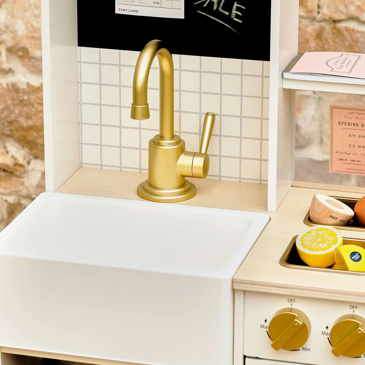 Tiny Land BistroSwitch Play Kitchen gold faucet with white sink and tiled backsplash on Tampa Home & Garden Store