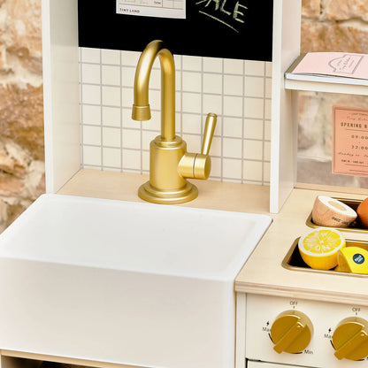 Tiny Land BistroSwitch Play Kitchen gold faucet with white sink and tiled backsplash on Tampa Home & Garden Store