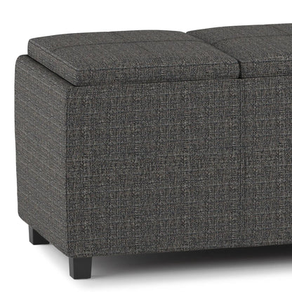 Avalon storage ottoman by Unique Piece Furniture in gray textured fabric with black legs on Tampa Home & Garden Store