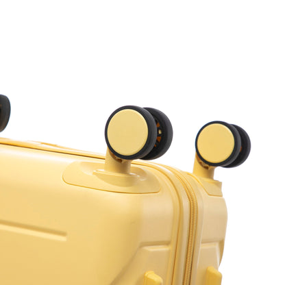 3-piece spinner-wheel luggage set close-up in yellow by HouseOfZazla on Tampa Home & Garden Store