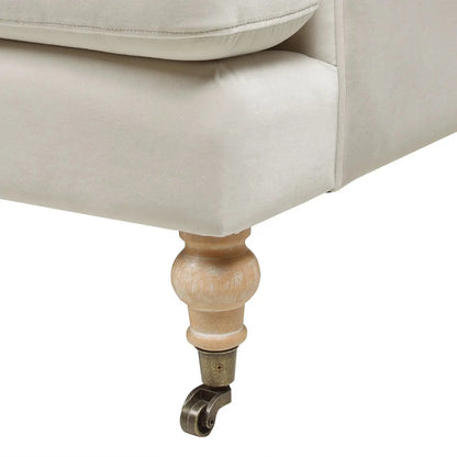 Alana Lawson two-cushion tightback sofa beige fabric with turned wooden leg and caster on Tampa Home & Garden Store