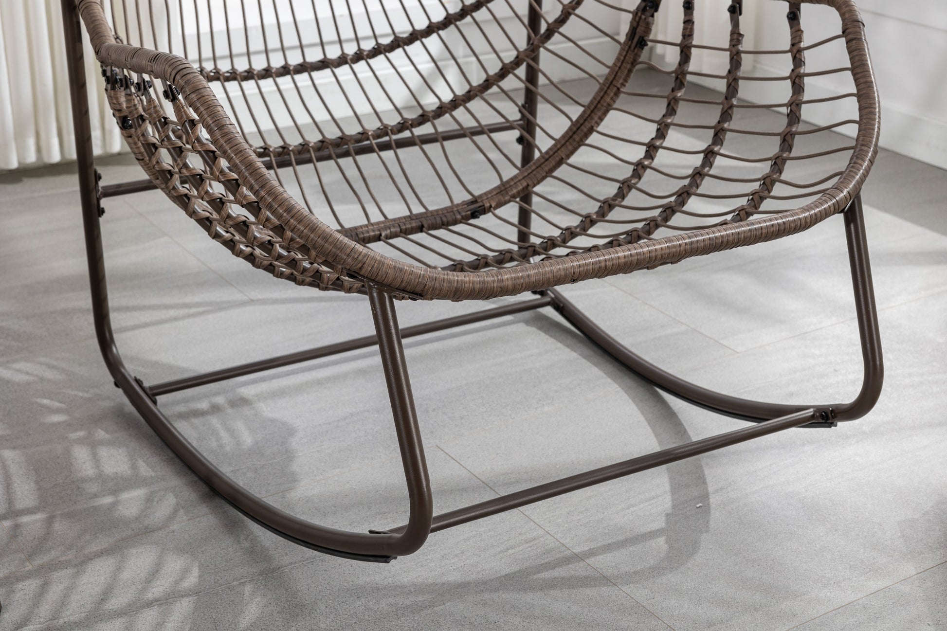 Outdoor rattan rocking chair with brown woven frame by HouseOfZazla on Tampa Home & Garden Store