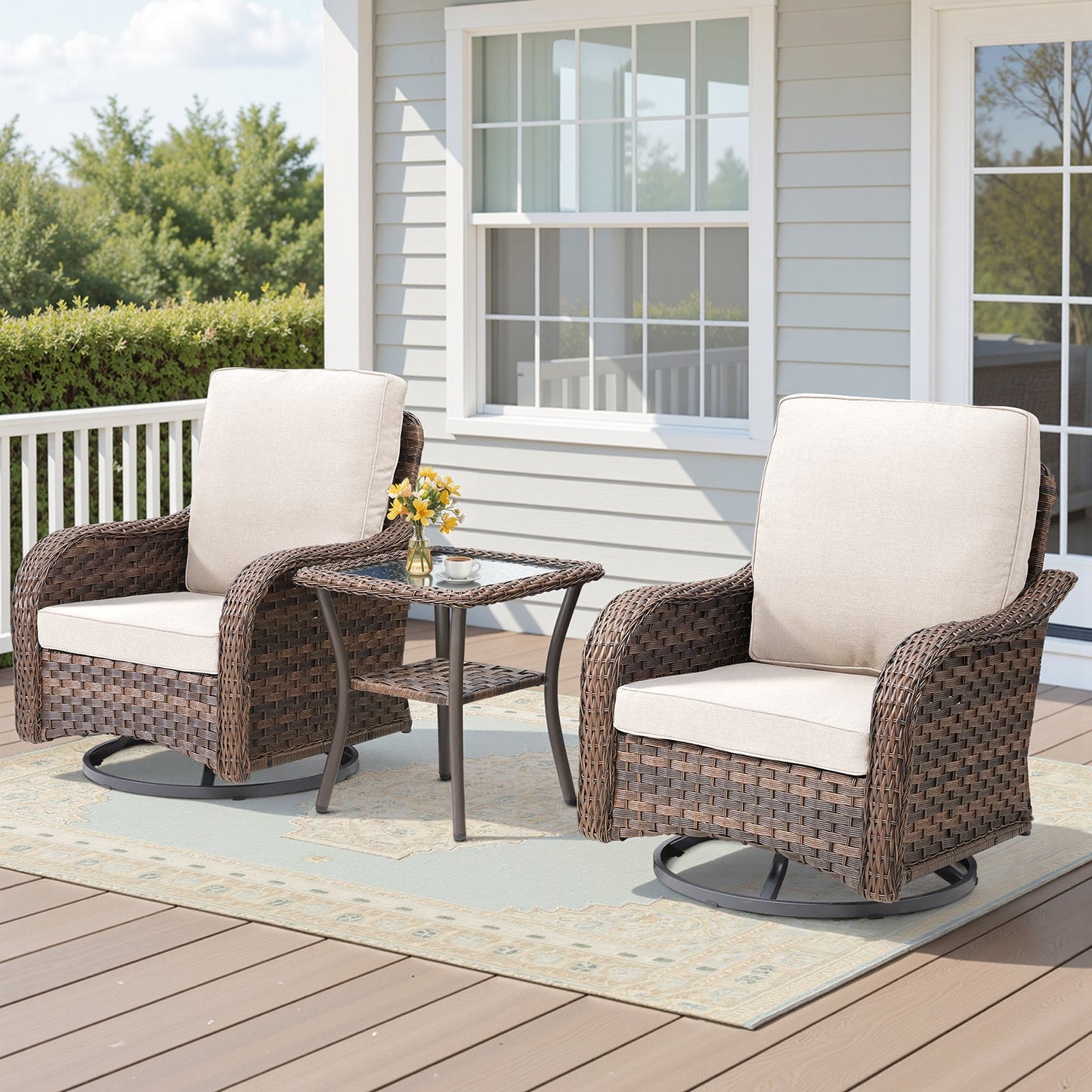 3-piece outdoor wicker set with two swivel rockers and glass-top table, beige cushions on Tampa Home & Garden Store