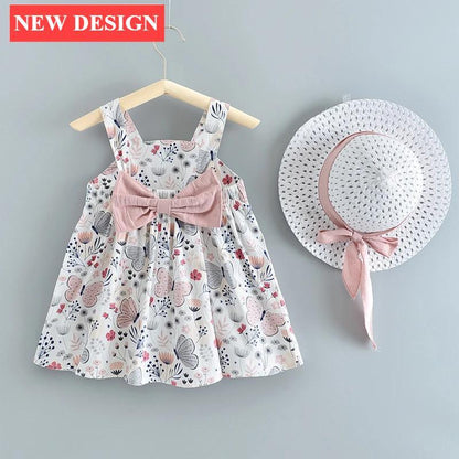 Newborn baby girl dress with floral butterfly print and pink bow, plus hat with pink ribbon on Tampa Home & Garden Store