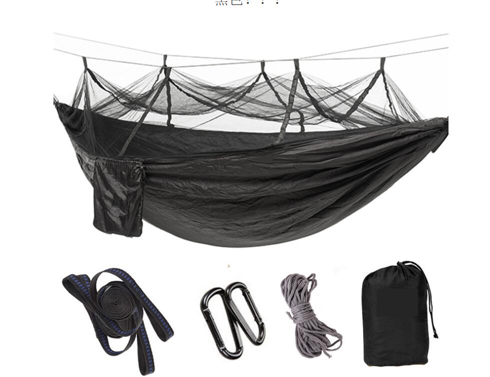Army green parachute hammock with mosquito net, straps, carabiners, rope and carry bag on Tampa Home & Garden Store