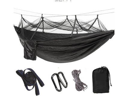 Army green parachute hammock with mosquito net, straps, carabiners, rope and carry bag on Tampa Home & Garden Store