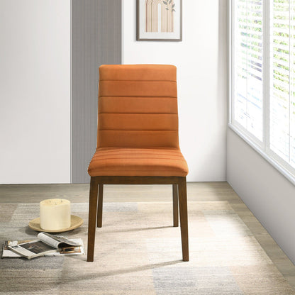 Modern dining chair with orange upholstery and solid wood base on Tampa Home & Garden Store