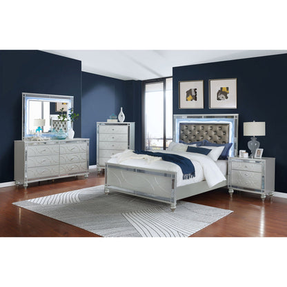 Karmen Panel Bed silver mirrored with tufted gray headboard in a navy blue bedroom on Tampa Home & Garden Store
