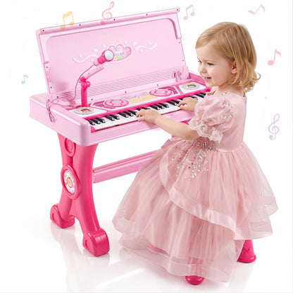 49-key kids electric piano keyboard DirectDeals pink with microphone and stool, child playing on Tampa Home & Garden Store