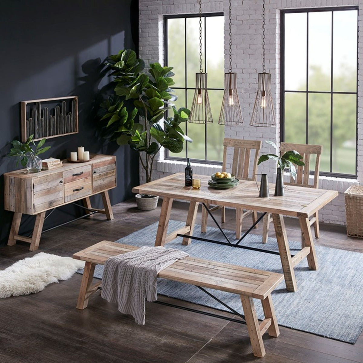 Solid wood dining bench with metal stretchers in light brown rustic dining room scene on Tampa Home & Garden Store