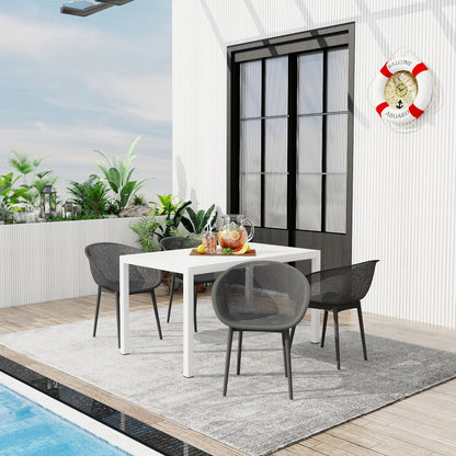 5-piece outdoor lounge set with white table and dark gray metal/plastic chairs poolside on Tampa Home & Garden Store