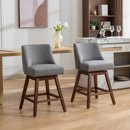 Counter height swivel barstools, set of 2 with gray fabric upholstery and dark wood legs on Tampa Home & Garden Store