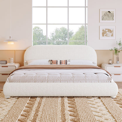 Upholstered bed with curved headboard in cream fabric, modern minimalist bedroom setting on Tampa Home & Garden Store