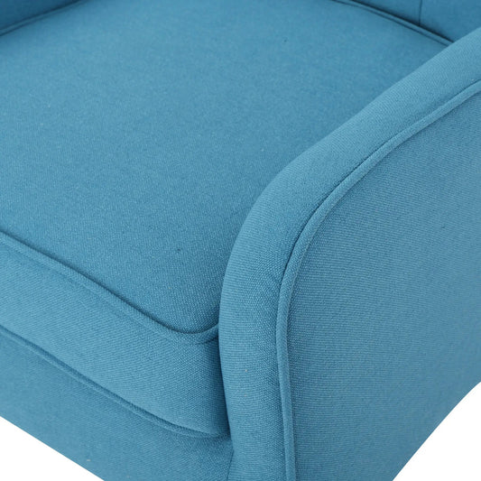 Teal fabric arm chair close-up showing textured upholstery and seam trim on Tampa Home & Garden Store