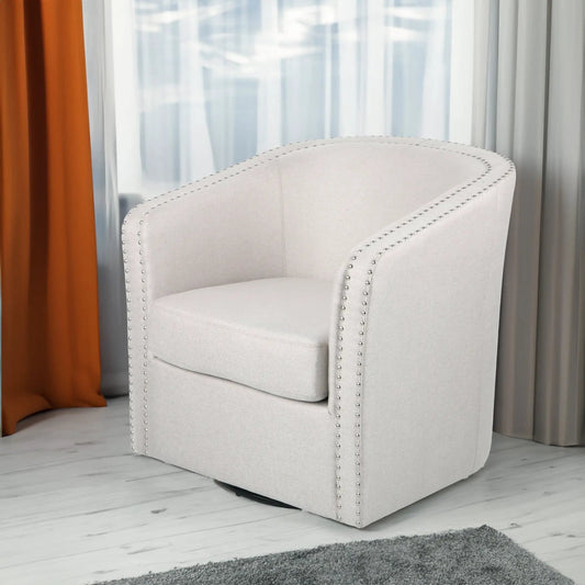 Wheat fabric swivel armchair with cushioned seat, beige upholstery and nailhead trim on Tampa Home & Garden Store