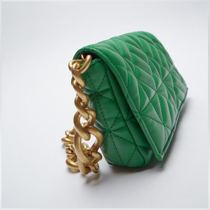Green quilted shoulder bag by Stevvex with thick gold chain strap, small flap clutch on Tampa Home & Garden Store