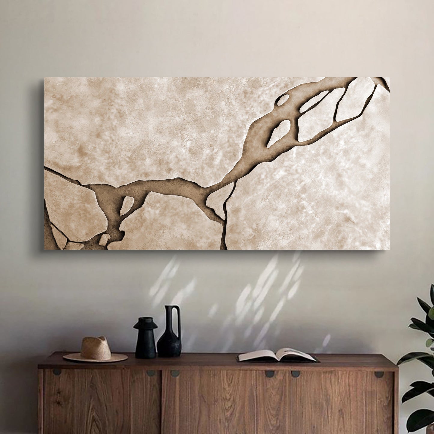 Muddy Abstract Wall Art canvas by Tailored Canvases in beige tones above a wooden sideboard on Tampa Home & Garden Store