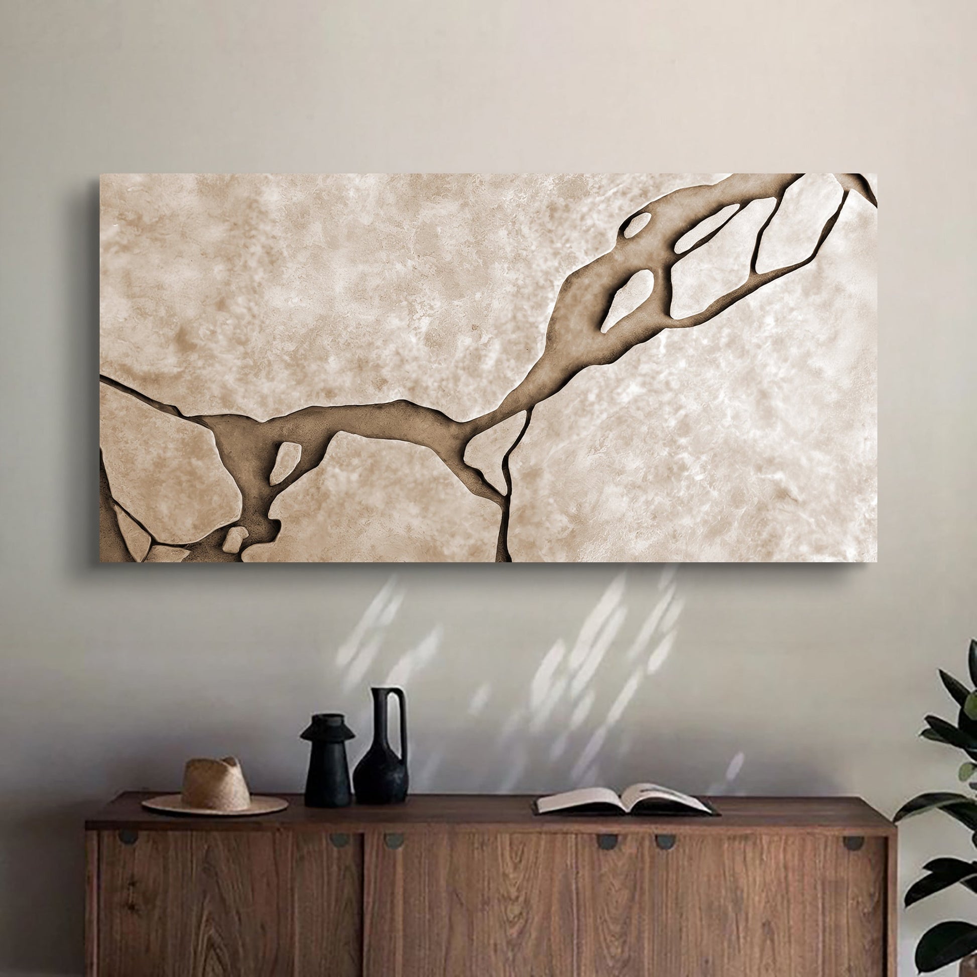 Muddy Abstract Wall Art canvas by Tailored Canvases in beige tones above a wooden sideboard on Tampa Home & Garden Store