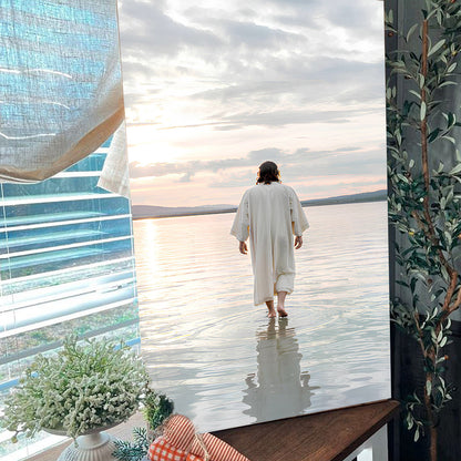 Reflections Faith Wall Art XV crafting canvas; white robe figure walks into sunset water on Tampa Home & Garden Store