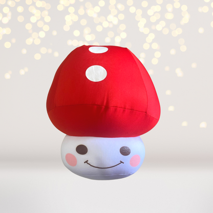 Plush Mushroom Toy and Squishy Toadstool Pillow with a red cap and white spots atop a blue face on Tampa Home & Garden Store