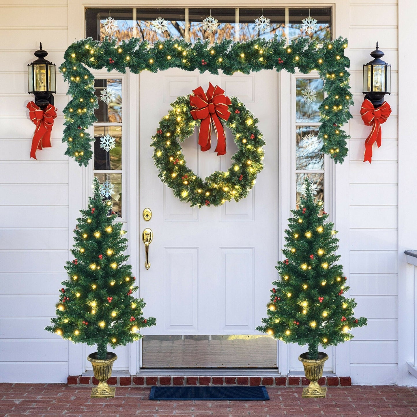 4-Piece Christmas Set: garland, wreath & entrance trees; green with lights and red bows on Tampa Home & Garden Store