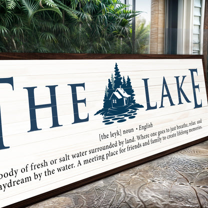 The Definition of Lake II canvas by Tailored Canvases with navy typography and pine silhouette on Tampa Home & Garden Store