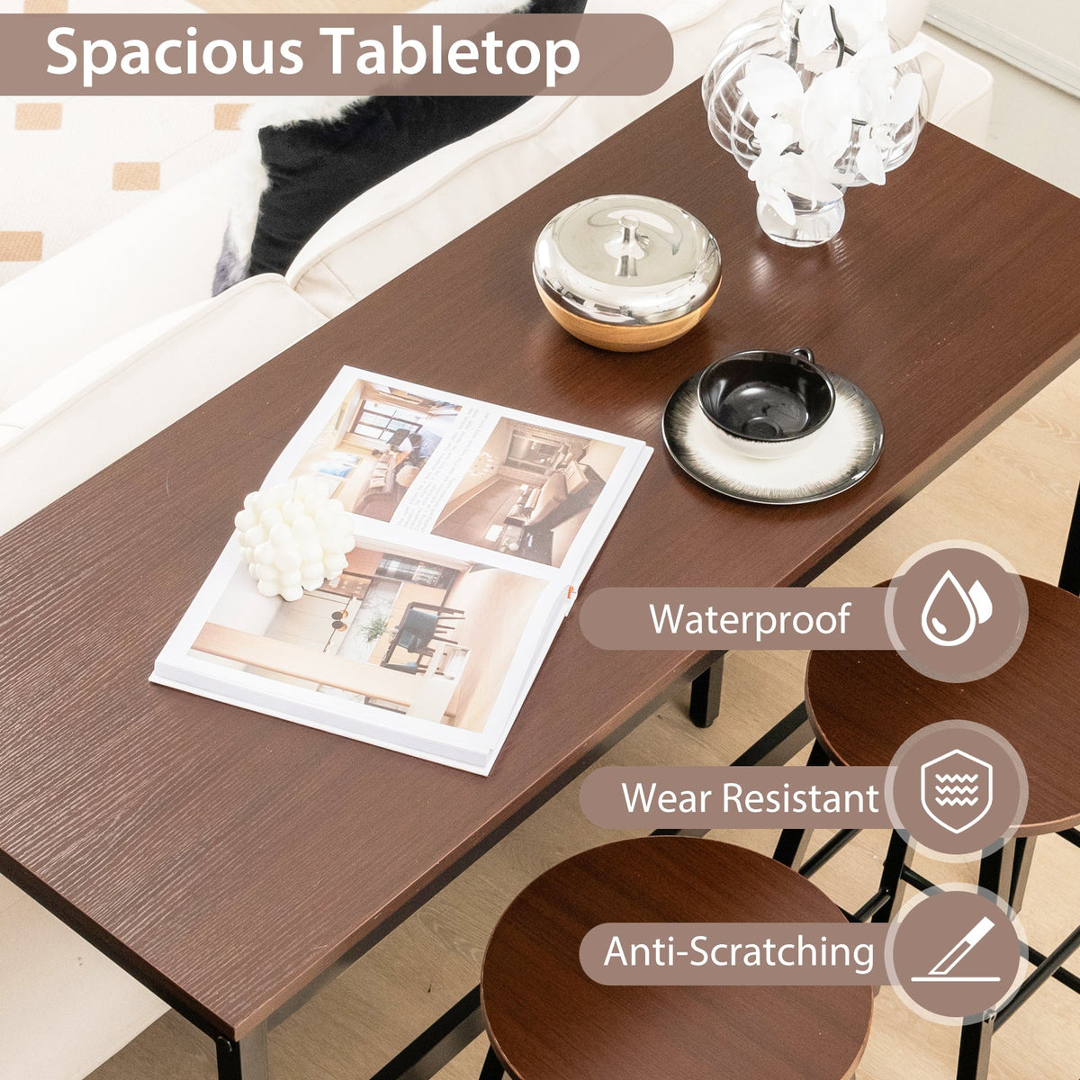 Dark wooden dining table with chrome container, black cup and saucer, and open magazine on Tampa Home & Garden Store