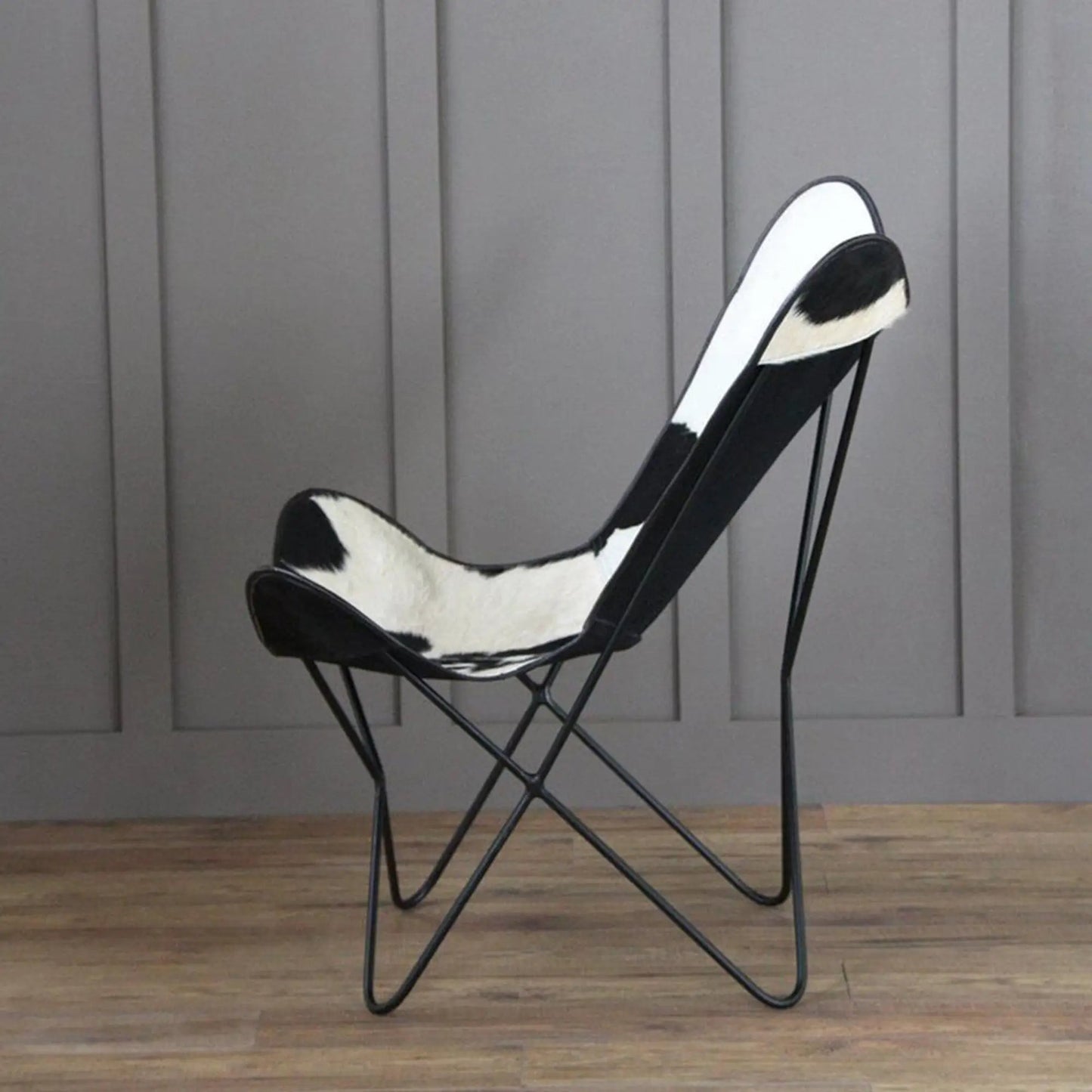 The Holsteins Butterfly Chair Classy Leather Bags, black metal frame with white and black cover on Tampa Home & Garden Store