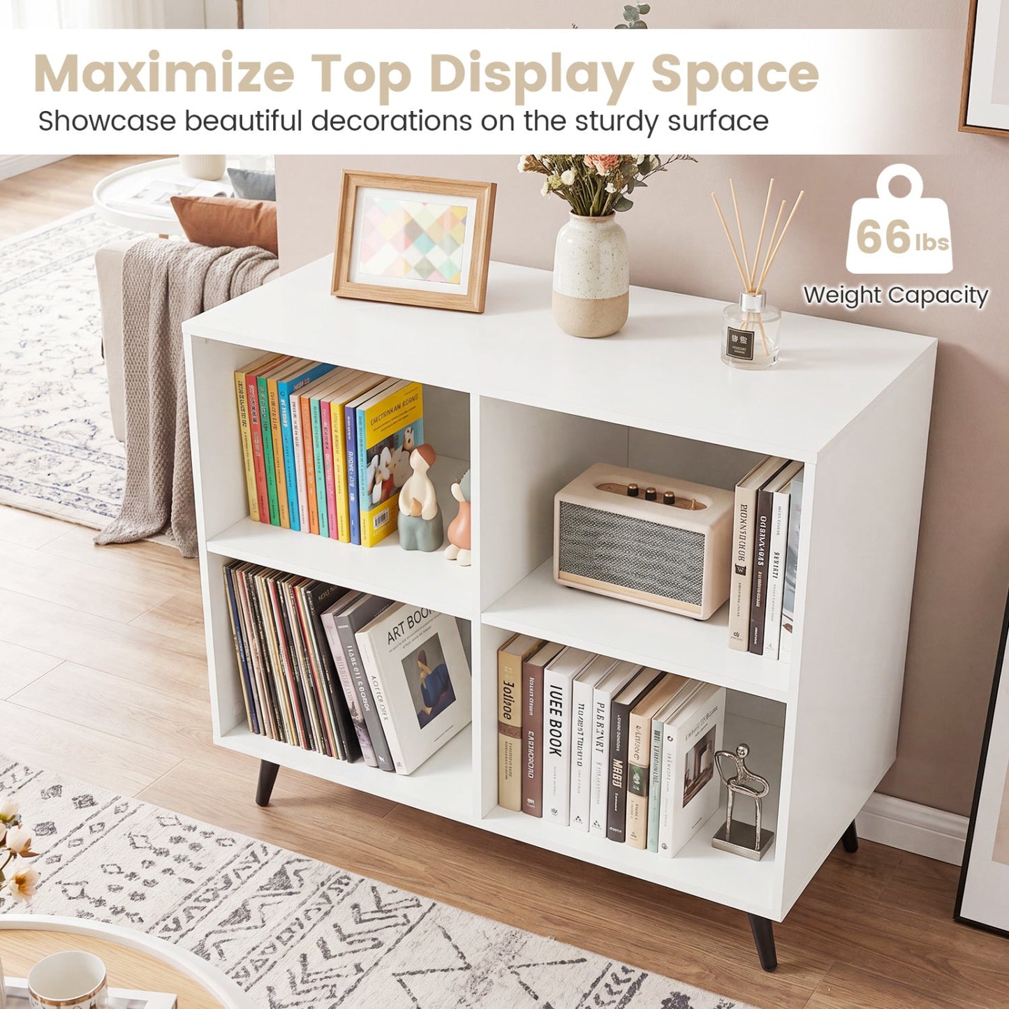 White 4-cube bookcase with metal legs, DirectDeals bookshelf filled with colorful books on Tampa Home & Garden Store