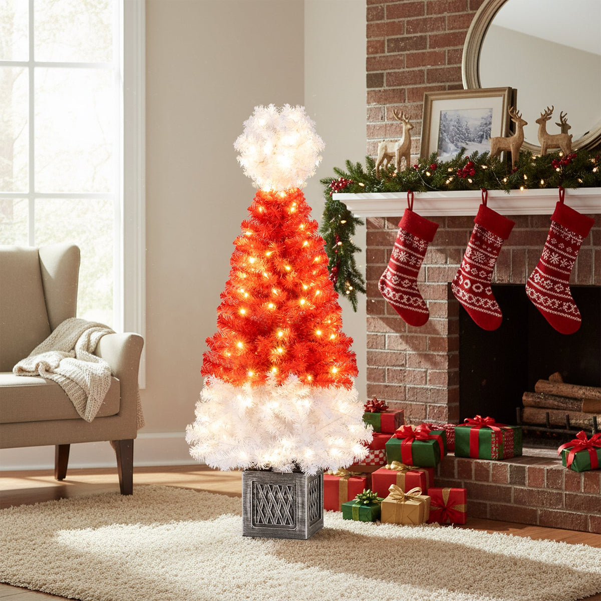 4 ft artificial Christmas tree with red body, white snowy tips and 100 warm white LEDs on a base on Tampa Home & Garden Store
