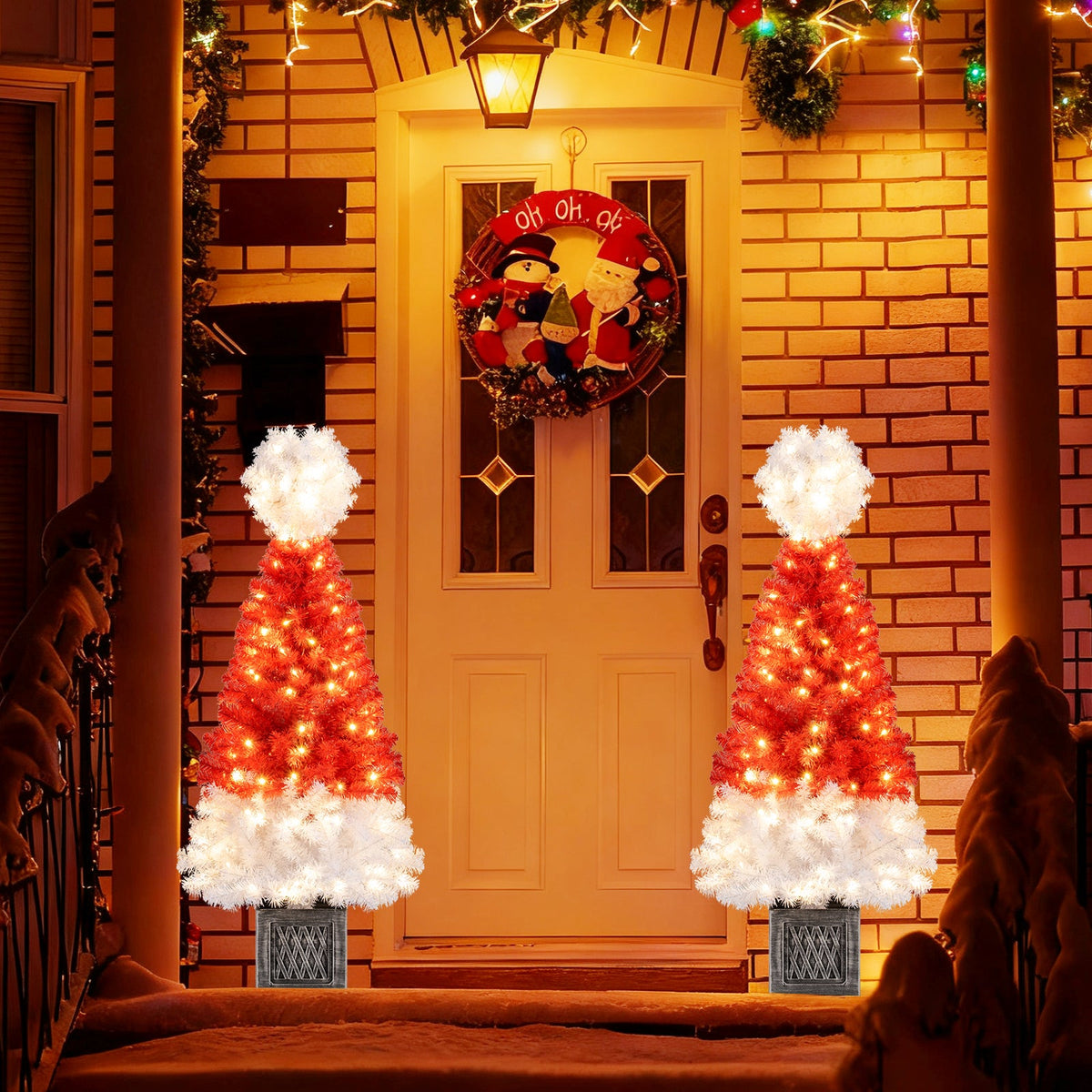 Two 4 ft red artificial Christmas trees with white tips, warm lights, 300 branch tips on Tampa Home & Garden Store