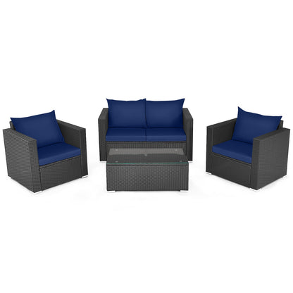 Juego de conversación de ratán para patio de 4 piezas con cojín acolchado y mesa de centro de vidrio templado - Blanco