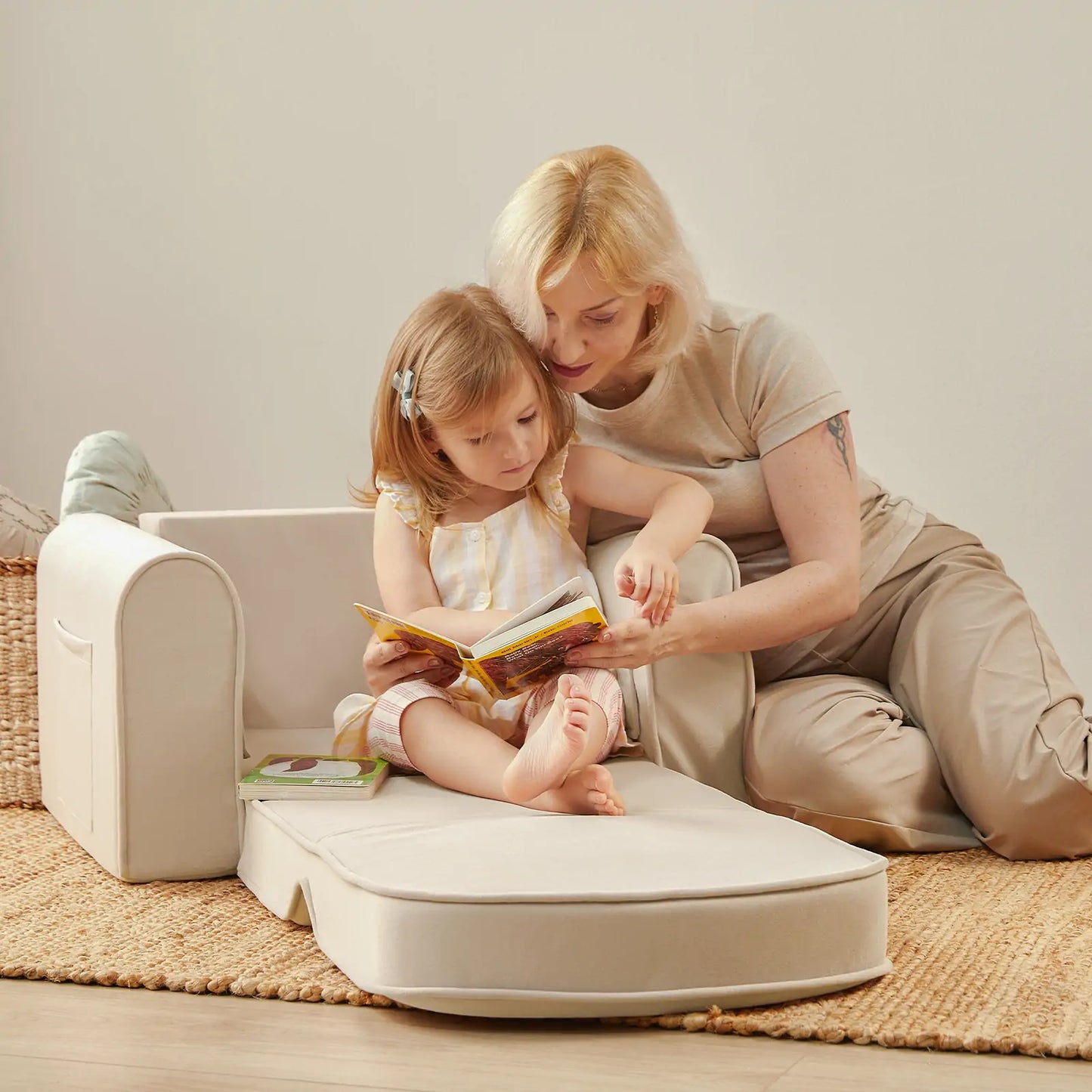 Tiny Land GentleSnug Kid Chair light beige upholstered kid chair; mother and child reading on Tampa Home & Garden Store