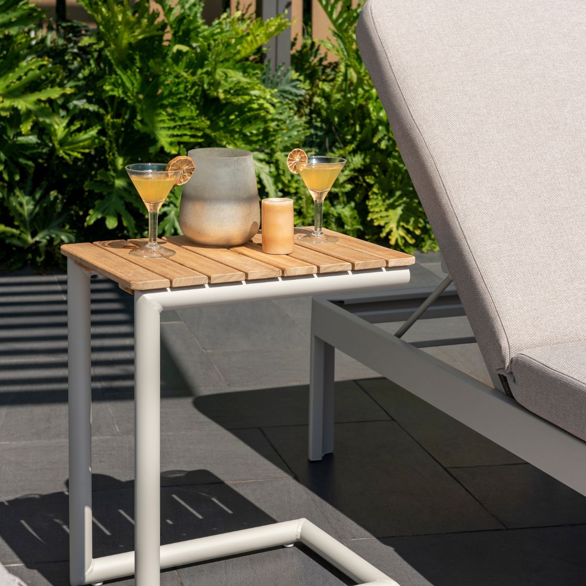Portals Light C-Shape Set outdoor lounge with beige cushion chair and wood slat table on Tampa Home & Garden Store