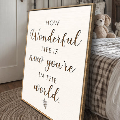 Nursery Sign II canvas How Wonderful Life Is by Tailored Canvases with frame beside teddy bear on Tampa Home & Garden Store