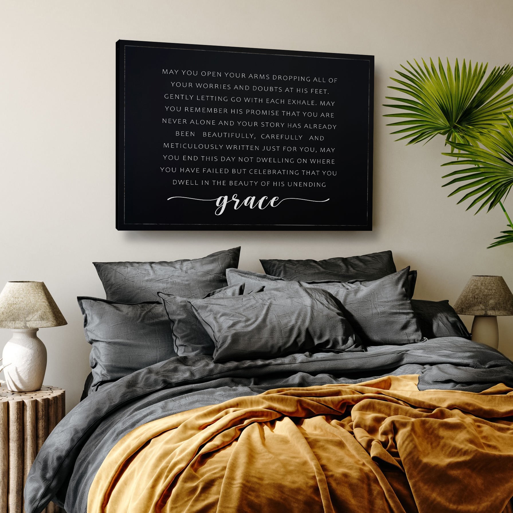 Unending Grace Faith Sign II canvas in black with white script grace, framed above gray bedding on Tampa Home & Garden Store