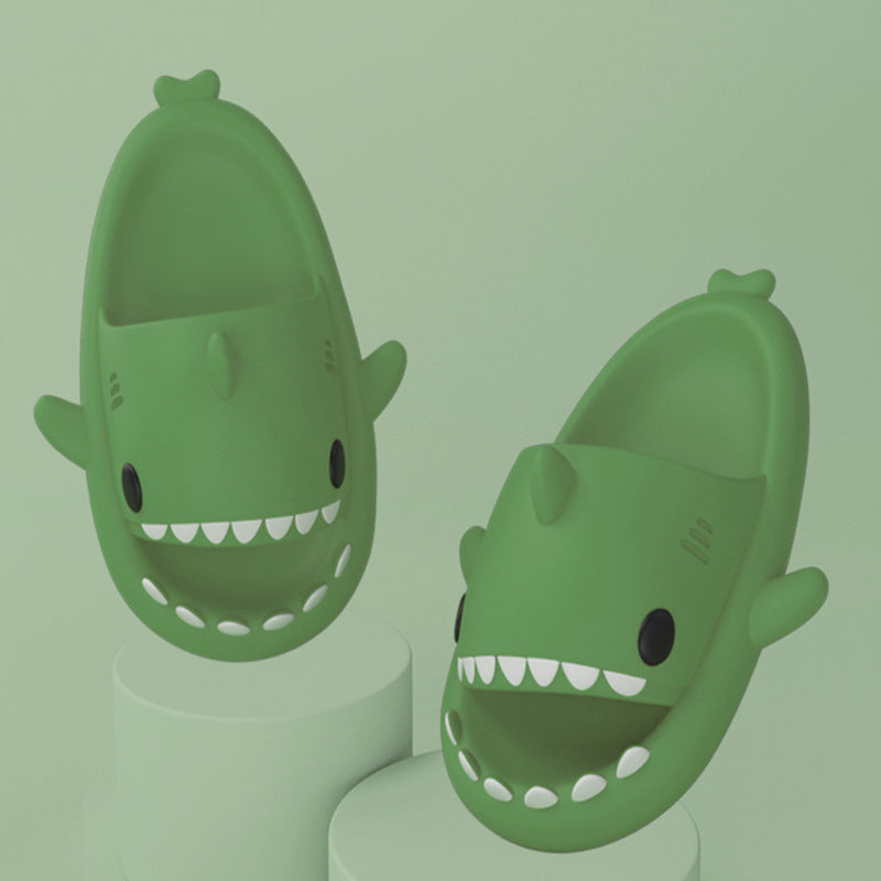 Stevvex green shark slides, two shark slippers on display on Tampa Home & Garden Store