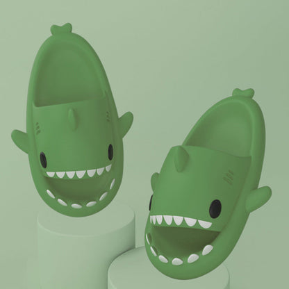 Stevvex green shark slides, two shark slippers on display on Tampa Home & Garden Store