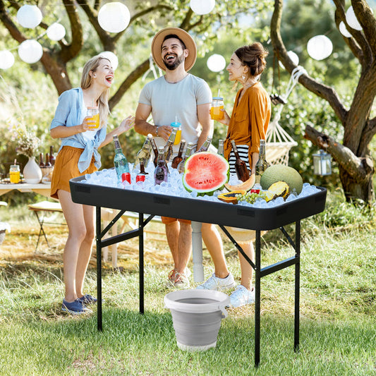 GemGear 4 ft plastic party ice folding table with matching skirt at an outdoor gathering on Tampa Home & Garden Store