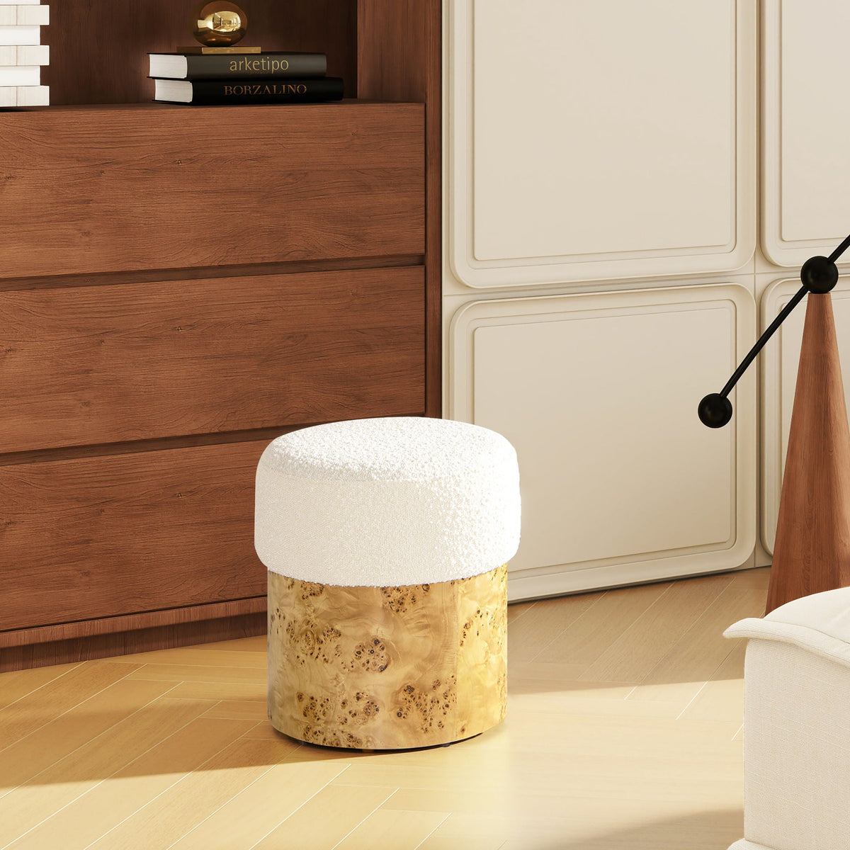 Round white boucle upholstered ottoman with textured fabric on Tampa Home & Garden Store