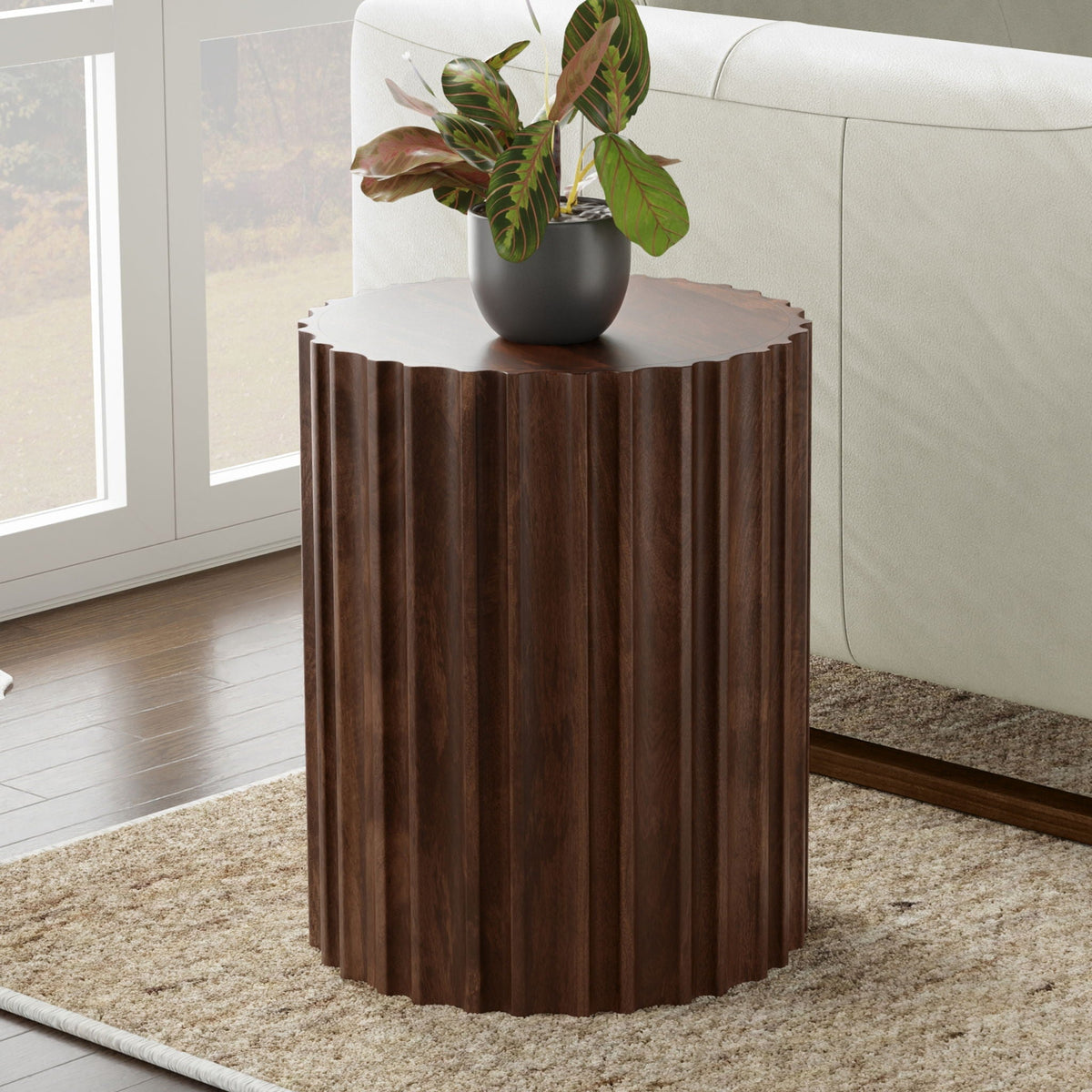 Rolf side table by HouseOfZazla; dark brown ribbed round wood pedestal with a potted plant on Tampa Home & Garden Store