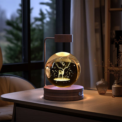 Crystal ball night light with deer silhouette and starry scene, USB powered warm lamp on Tampa Home & Garden Store