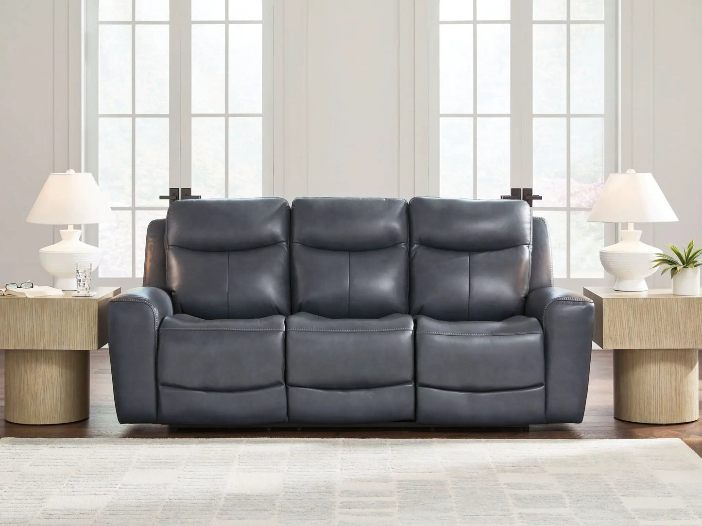 Bexhurst power reclining sofa with adjustable headrest in leather by Unique Piece Furniture on Tampa Home & Garden Store