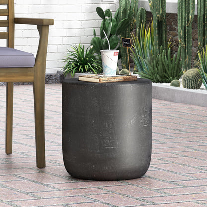 HouseOfZazla matte-black outdoor concrete end table with natural texture on a patio on Tampa Home & Garden Store