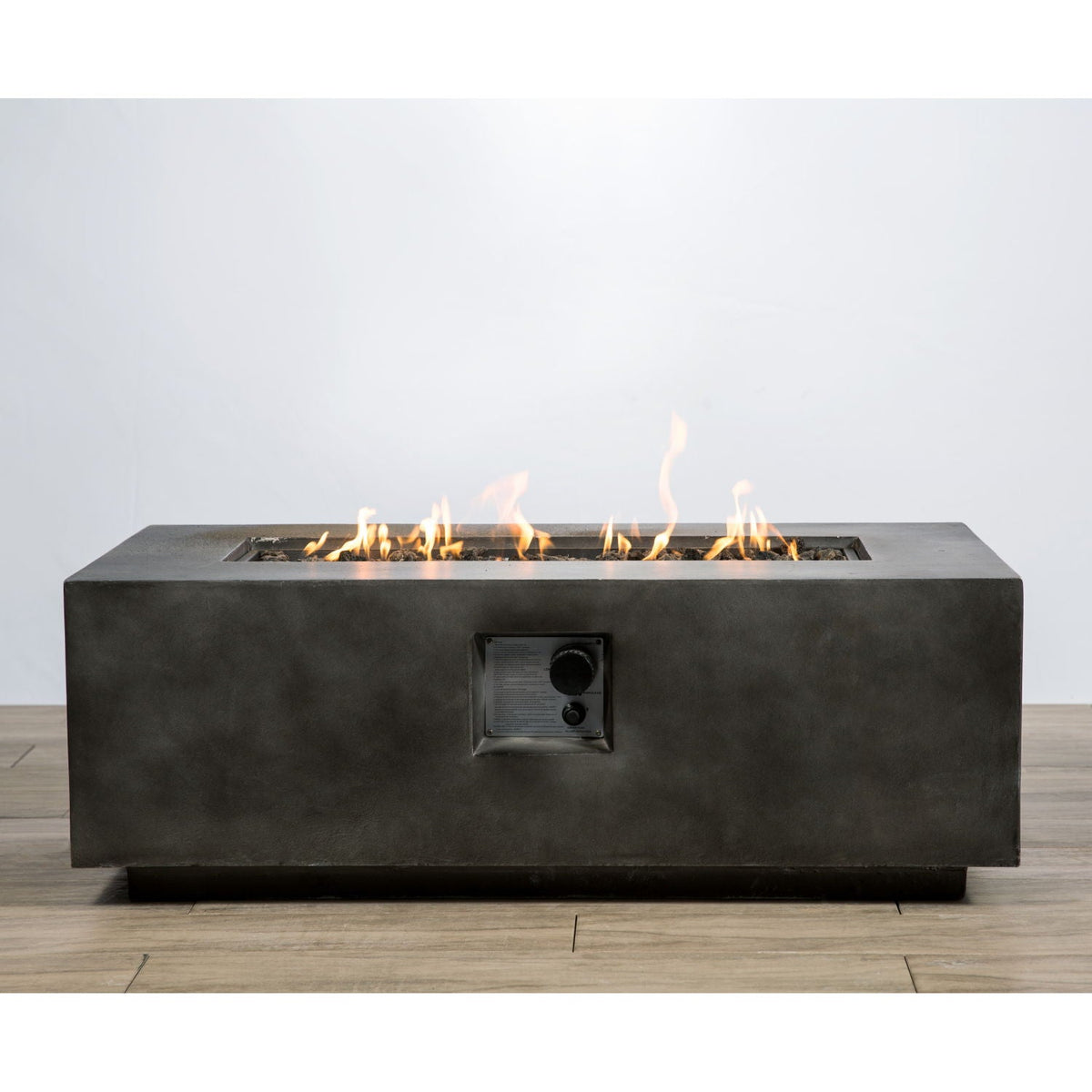 Fire pit table in dark gray fiber concrete with push-button ignition and control panel on Tampa Home & Garden Store