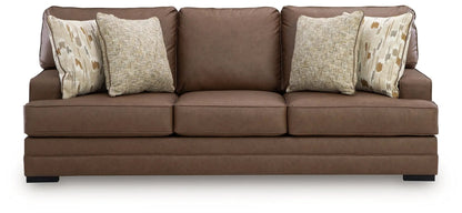 VillaCourt Sofa caramel brown leather upholstery stationary sofa with neutral pillows on Tampa Home & Garden Store