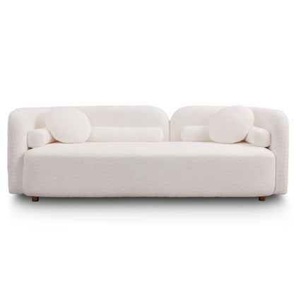Modern Three Seater Couch And Fluffy Pillows